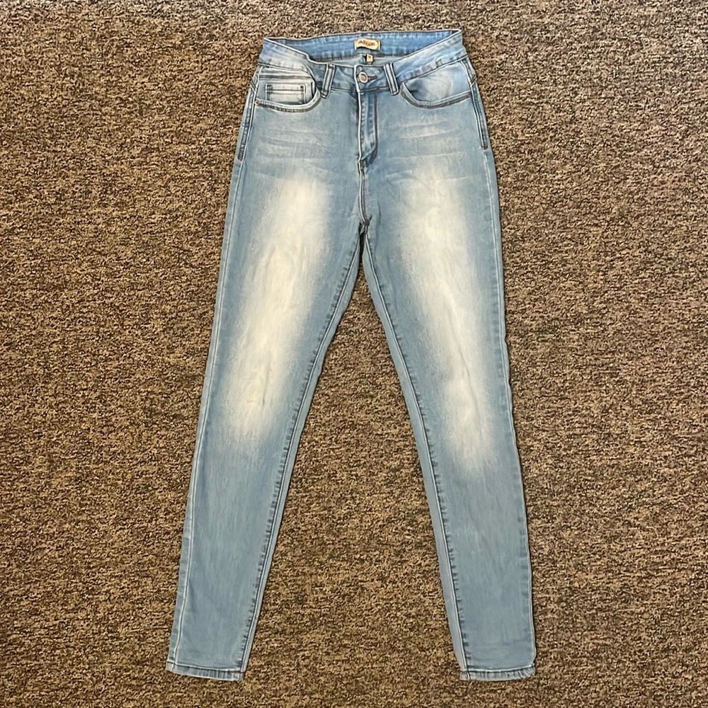 Distressed light wash jeans